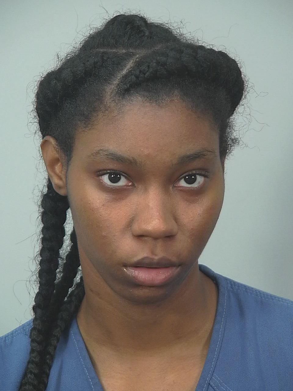Woman pleads guilty to providing gun that killed teen in June, other charges